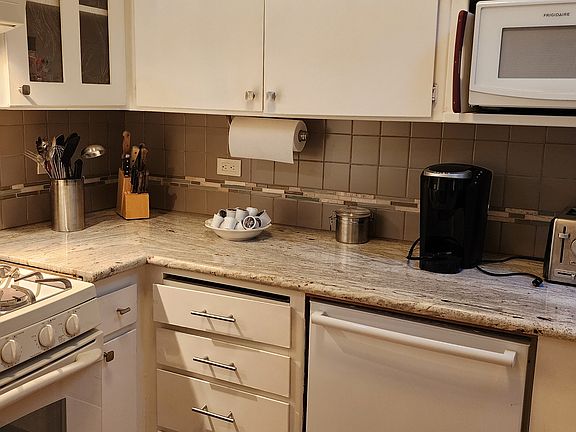 Dishwasher, microwave, gas stove.
