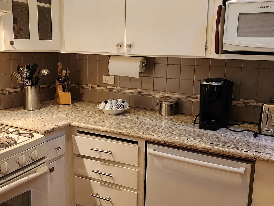 Dishwasher, microwave, gas stove.