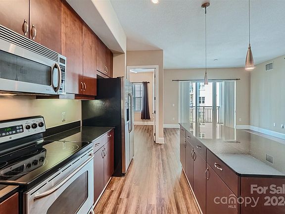 5th image of 4625 Piedmont Row Dr Unit 411