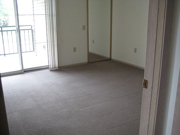 12x12 bedroom with attached bath and large walk-in closet