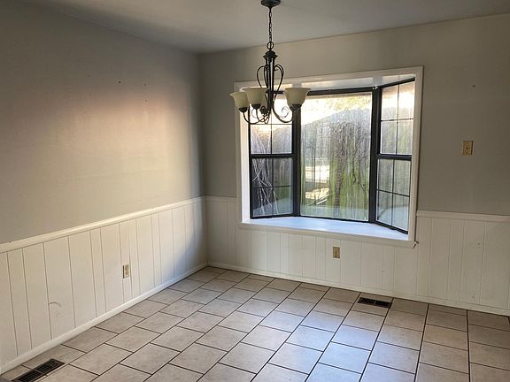 Dining room with bay window.