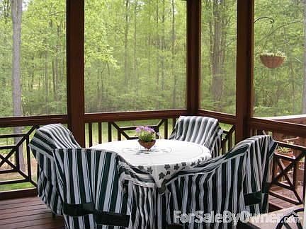 View of screened porch.
						:
						The porch is large enough for full sized furniture. 