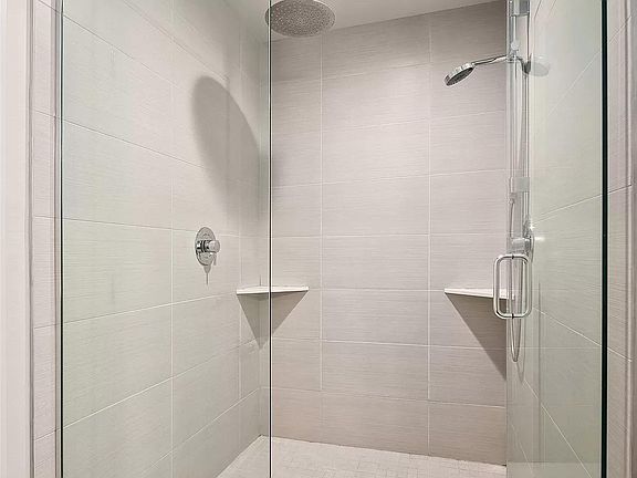 primary bedroom twin walking shower