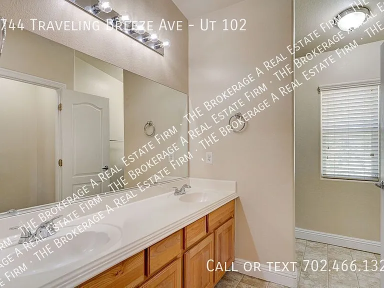 8744 Traveling Breeze Ave #102 — Photo 24