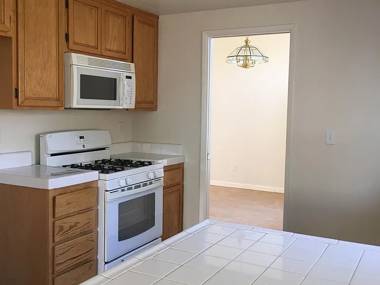 This is an old pic. New countertops will be granite.. still to be installed. And the appliances are stainless