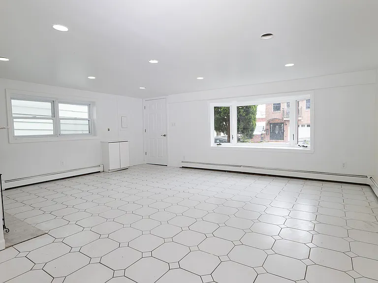 Large living room with plenty of light.