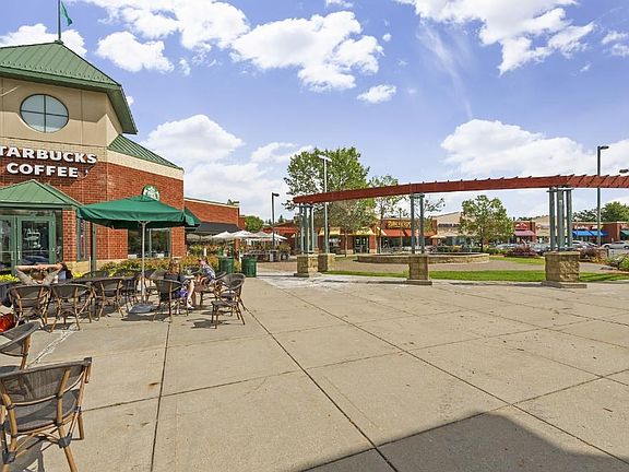 Less than 1/2 mile to tons of shopping, restaurants, coffee shops, and the library!