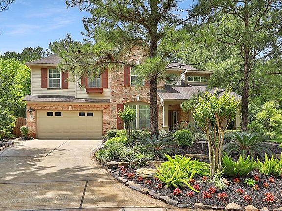 Well manicured landscaped lot with many mature trees! Back to greenspace.