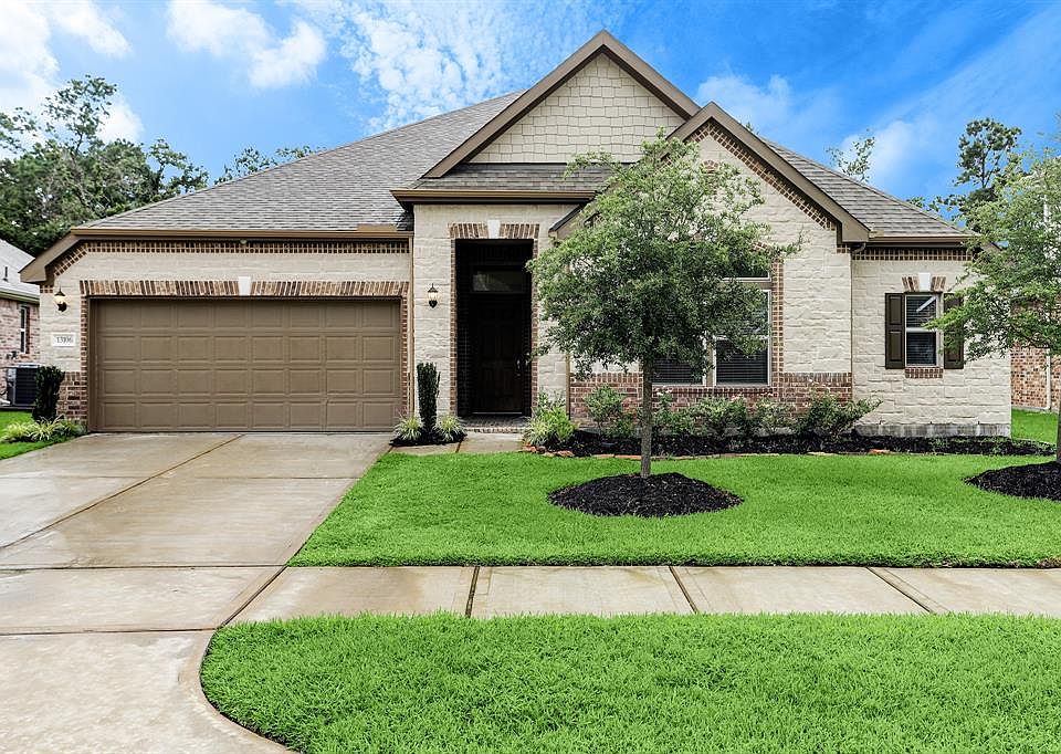 Welcome to 13106 Bellwick Arbor Trace in the gated estates of Lakewood Pines!