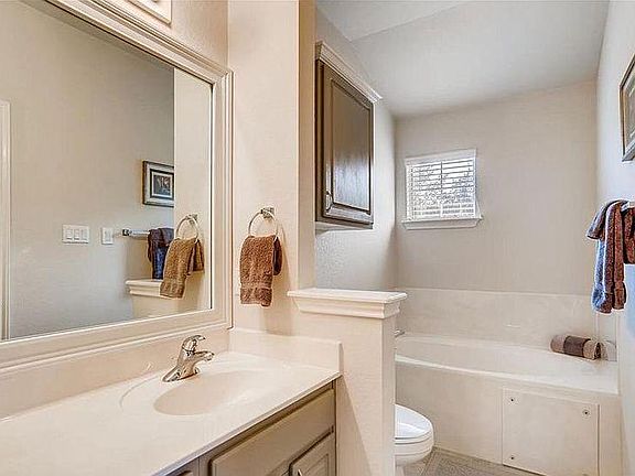 Master Bathroom with Jetted Tub, Shower and Double Vanity.