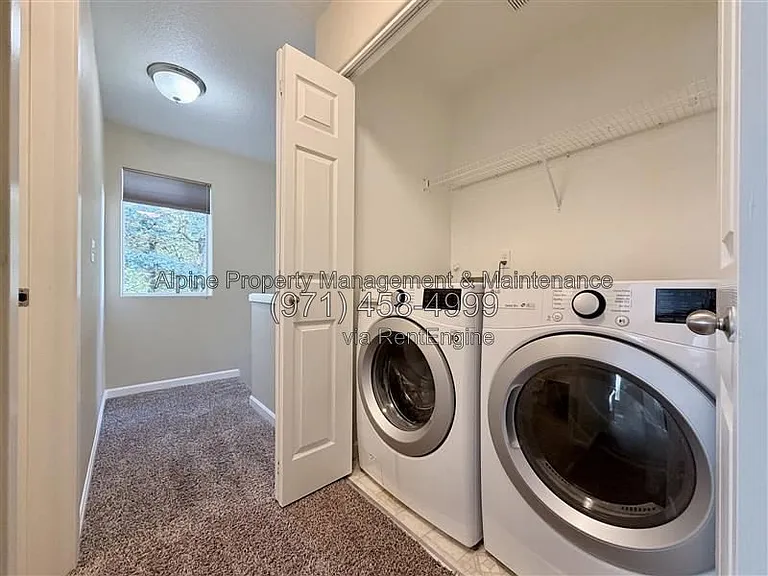5758 NE Damsel Dr — Photo 18