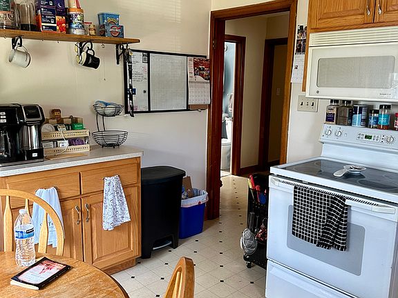 Kitchen includes stove and over stove microwave