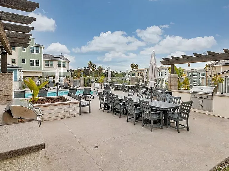 Resort style pool complex with dining, BBQ, fire pits, showers, loungers, etc.