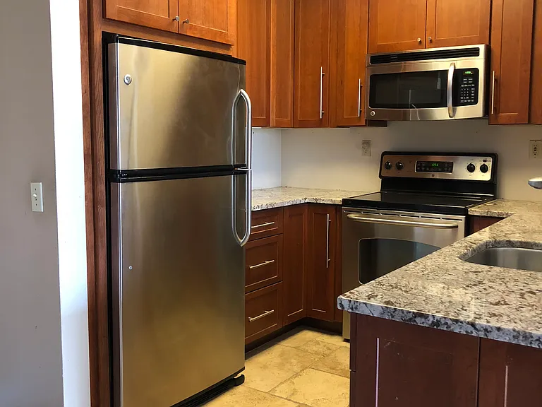 Kitchen, stainless steel appliance, soft-close cabinet doors, stainless deep sink, water filter