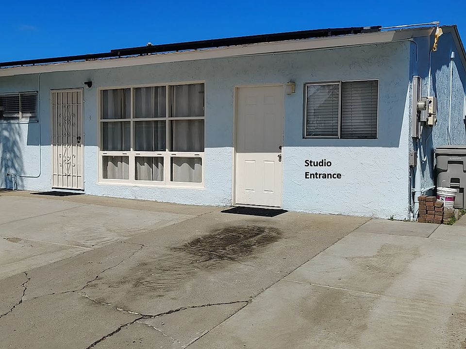 Studio entrance and parking space