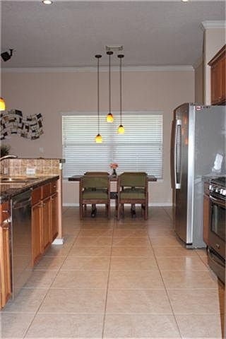18" ceramic tiles and stainless dishwasher