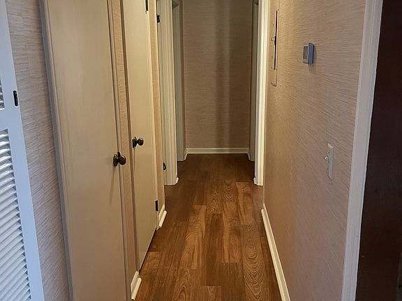 Hallway with two closets for storage or it could be used as a linen closet.