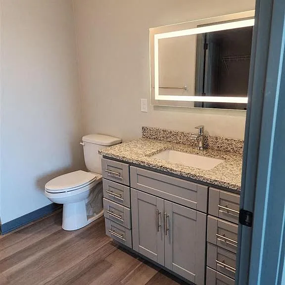 Bathroom with granite countertops at The Harbor.