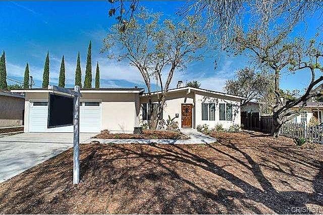 This meticulously remodeled home offers a new composition roof,