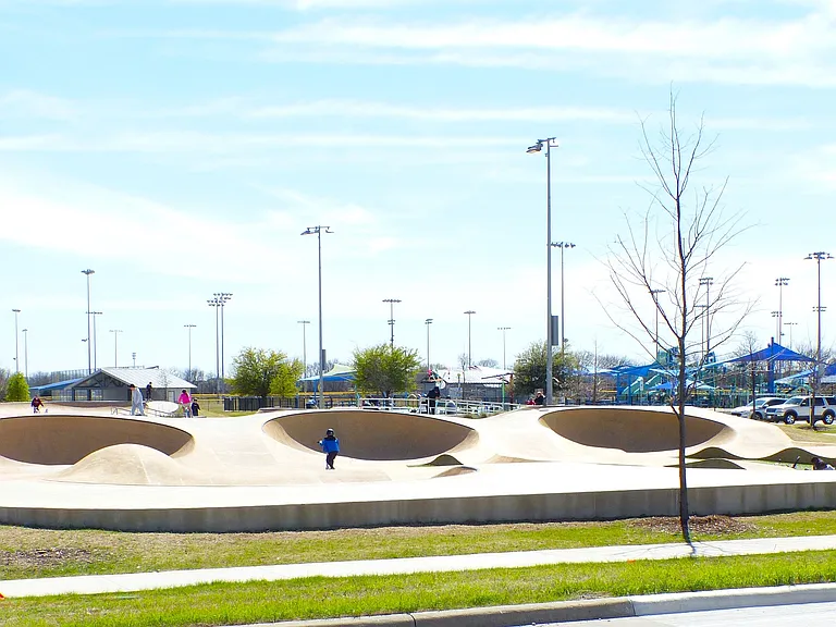 View of the skatepark and pump track for biking and skateboard activities