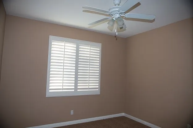 Secondary bedroom with upgraded shutters