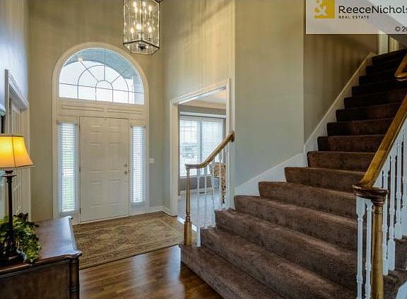 New carpet and freshly stained hardwoods