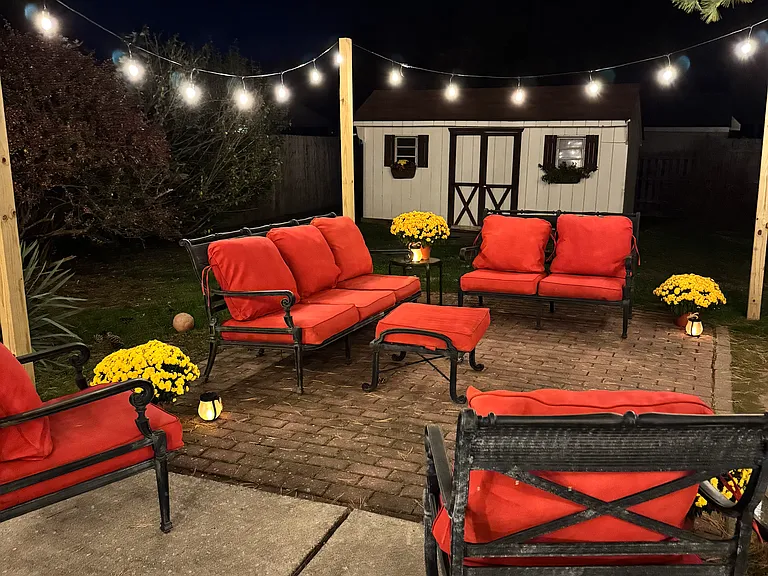 Twinkle lights, firepit, and grill.