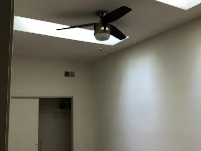 Third floor loft with skylights. This may be used as additional bedroom or office.