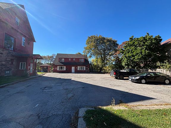 Parking lot and Carriage House