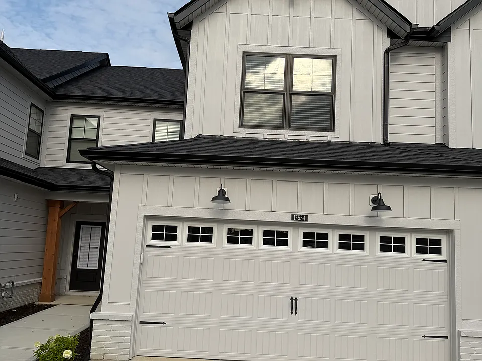 Front view of Home, front door on left side of garage