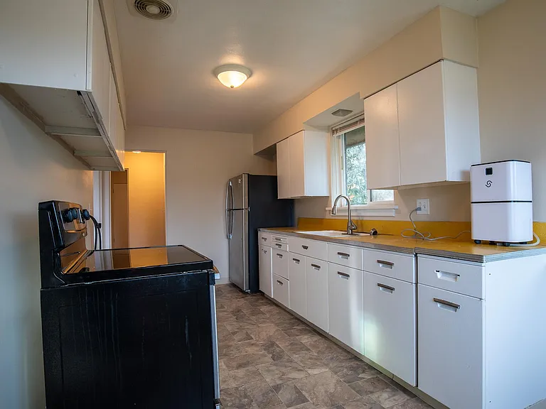 Kitchen with stainless steel appliances