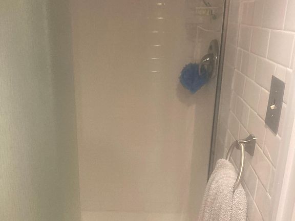 separate shower next to bathroom