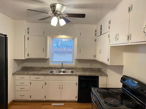Kitchen: New counter top, new plumbing, new garbage disposal, unit has an electric stove, side by side refrigerator and dishwasher.
