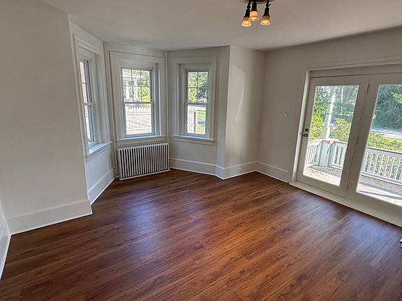 Sitting Room with sliding door to front porch
