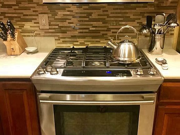 New Appliances With Custom Glass Tile Backsplash!