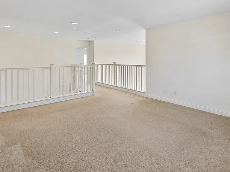 Upstairs Loft Overlooking to Formal Dinning Room and Access to your Private Master Bedroom.