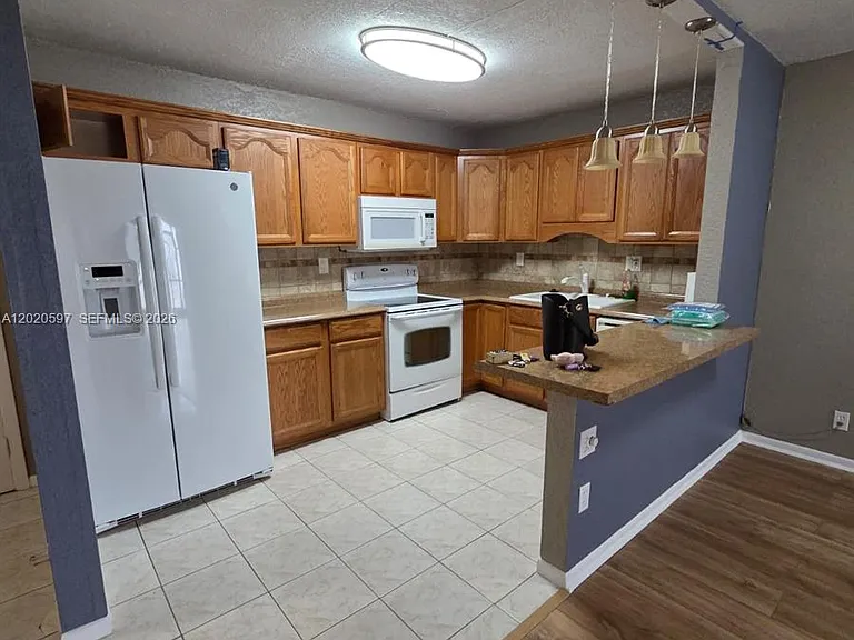 4133 NW 88th Ave #102 — Photo 1