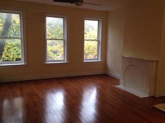 Great room with view of windows and mantle