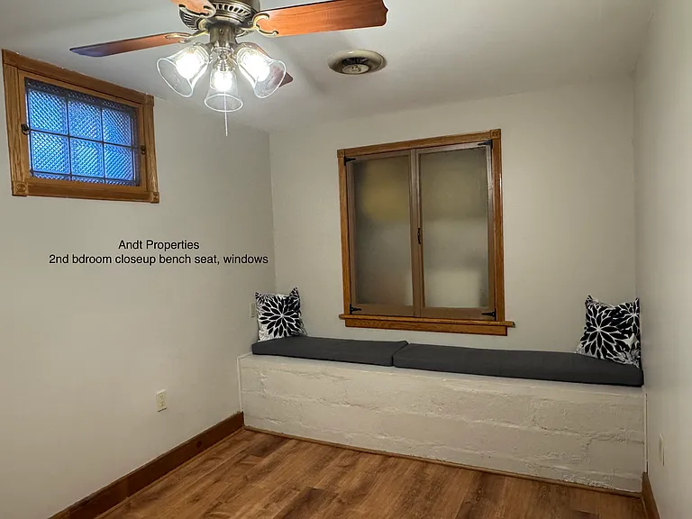 2nd bedroom with wall bench