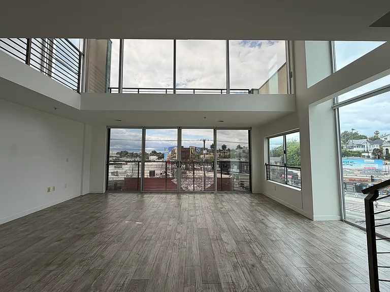 Double height space with private Juliette balcony