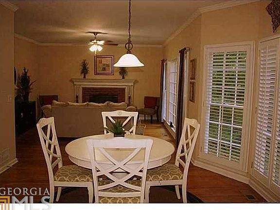 Kitchen opens to breakfast room and great room! Breakfast room includes bay window overlooking lush 