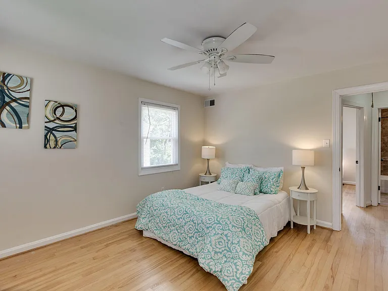 Hardwood floors now stained a darker color
