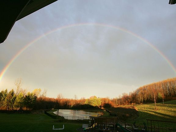 Nice rainbow shot off the back covered porch