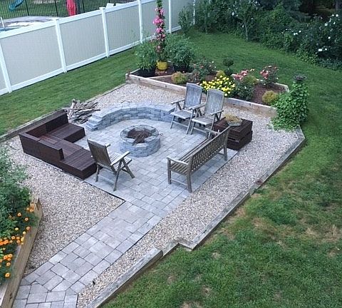 backyard stone patio firepit