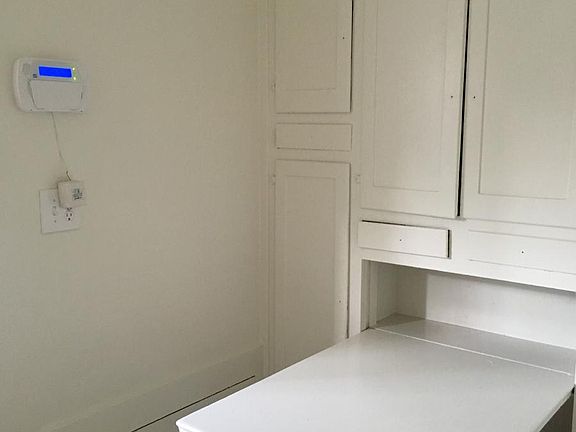 Kitchen with lots of storage and built in breakfast nook