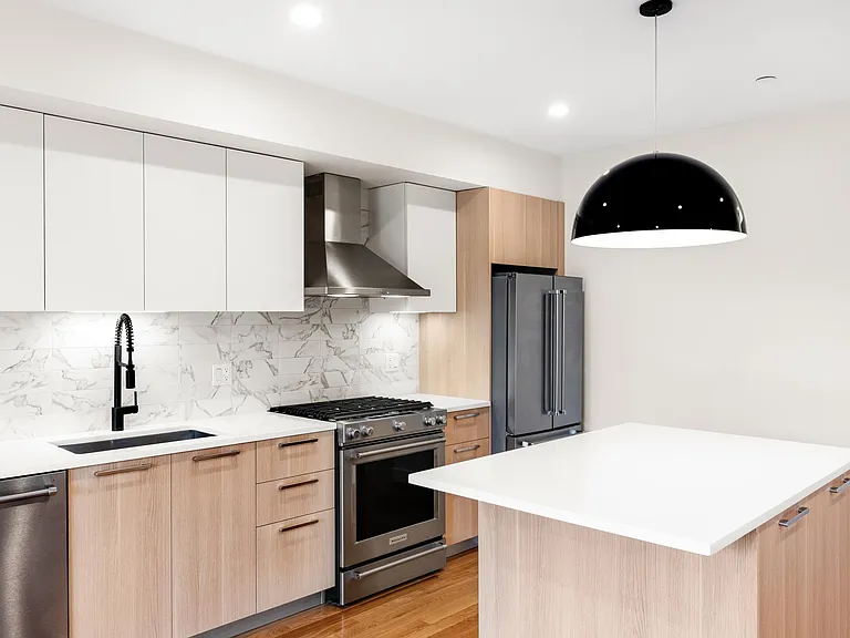 Chefs Kitchen W/ Gas cooking, Vented hood, quartz counter-tops, Italian cabinetry and Stainless steel appliances