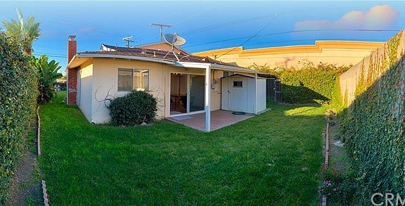 Private front and back yards - storage shed and areas. Block walls and gated. Newer automated sprinklers and lush landscaping. Separate dog run.