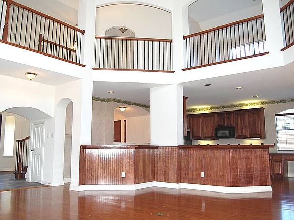 Family room, hardwood flooring, 2nd floor media and game rooms