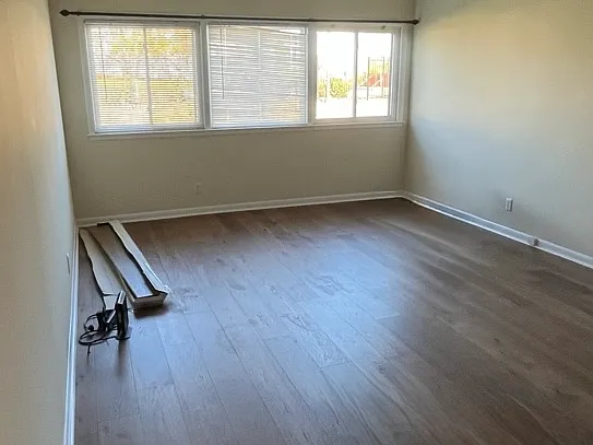 Living room with brand new wooden floors