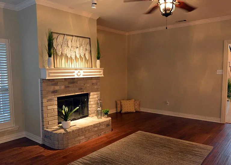 Family room with second wood burning fireplace with gas starter